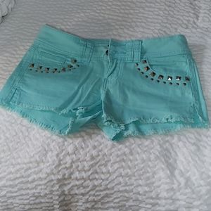 Short with studs by the pockets